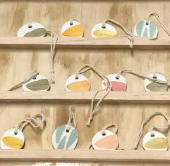 Ceramic fragrance essential oil diffusers with sage leaf and fern leaf design in colours of green, yellow, orange, red 